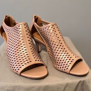 Beige heeled sandals.